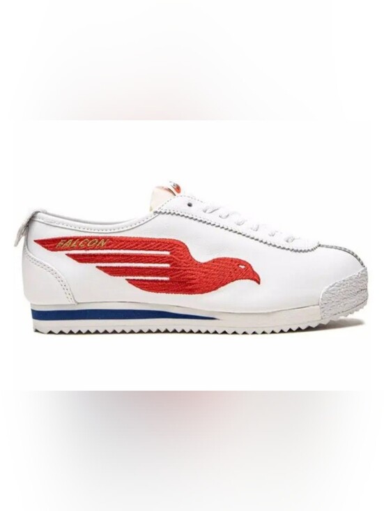 Nike Shoes - Nike Women’s White Sneakers with Red Eagle Accent and Blue Trim